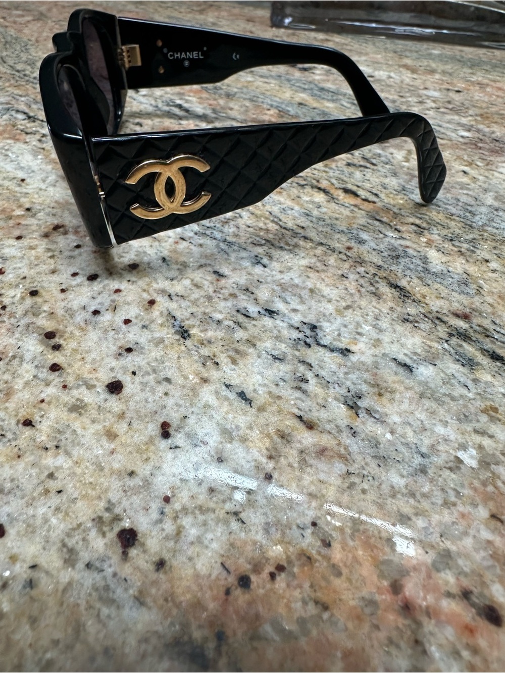 AUTHENTIC CHANEL Black Quilted Temple Sunglasses with Gold CC Emblem. COA